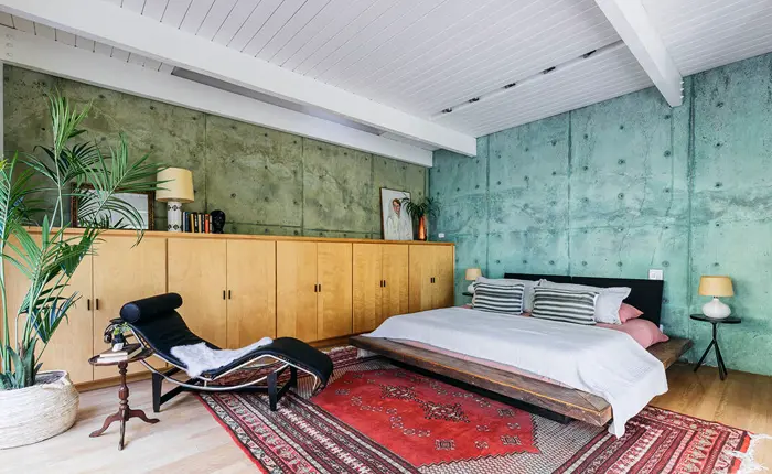Primary bedroom in the Woodrow Wilson Modernist Architectural Home by Perry Neuschatz