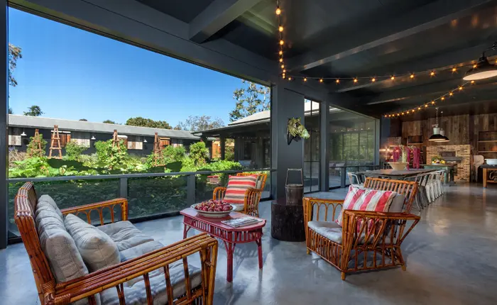 Patio of the Brentwood Modern Belgian Farmhouse designed by Howard Backen of Backen Giliam & Kroger