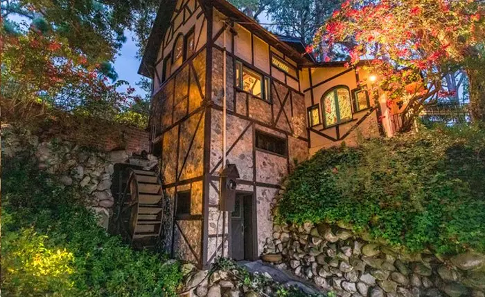 Historic Pasadena storybook cottage with water wheel.