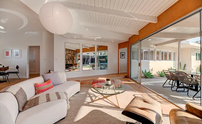 Living room with an indoor outdoor flow of a Mid Century Modern Hollywood Hills home
