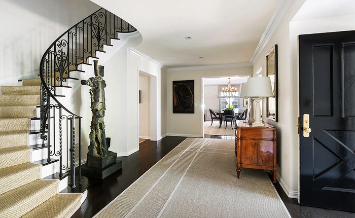 The grand iron staircase of Historic Bel Air Estate by Wallace Neff. 