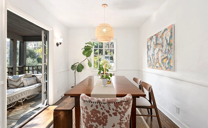 This Beachwood Canyon English Tudor duplex has formal dining room leading to a private balcony