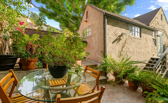 Beachwood Canyon English Tudor duplex with a private front yard