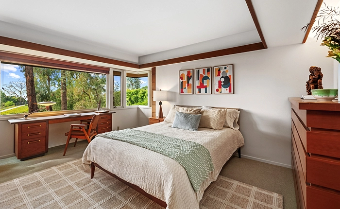 Primary bedroom of The Melzer Residence, a James De Long Mid Century Modern home