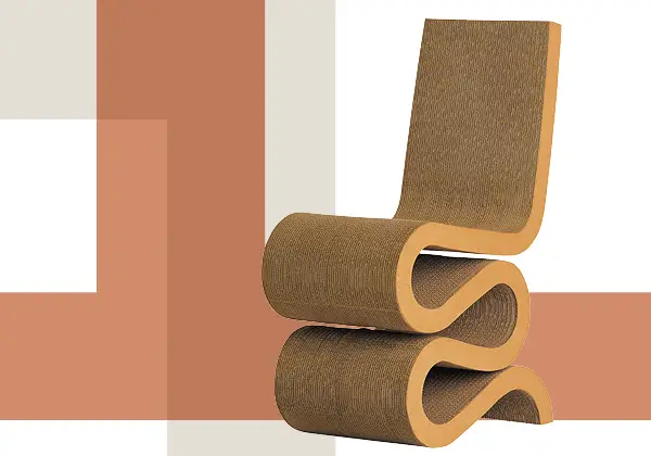 A modern Wiggle Chair with a curvy, zigzag shape made of layered brown material, designed by Frank Gehry, set against a geometric background with beige and terra cotta blocks.